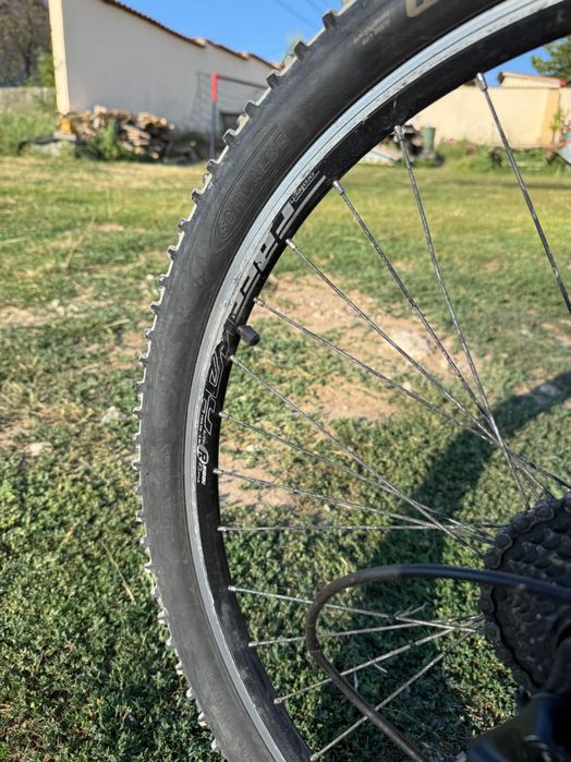 Bicicletă full suspensie roți pe 26