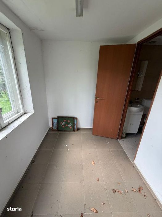 Casa de vanzare ,90 mp constructie ,teren 650mp ,str Rozelor,Filiasi