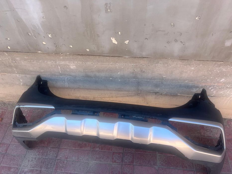 Задний бампер для Kia Sportage