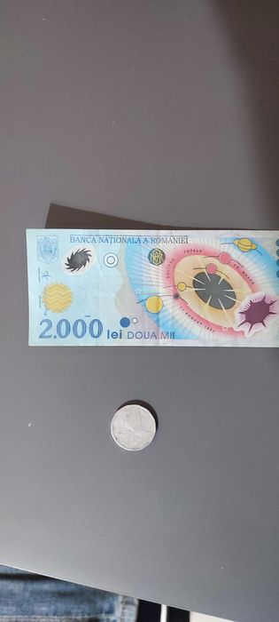 Vând bacnota cu eclipsa 2000 și moneda de 5000 lei