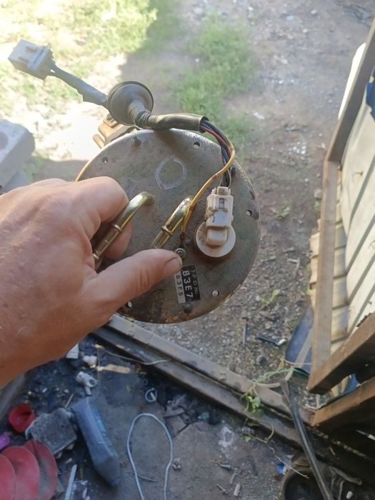 Бензонасос станция мазда323