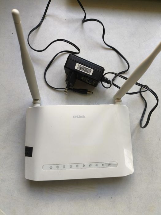 Беспроводной маршрутизатор (Wi-Fi роутер) D-Link (белый, 4 порта, DSL-