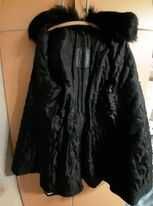 Кожено палто с яка от дълъг косъм