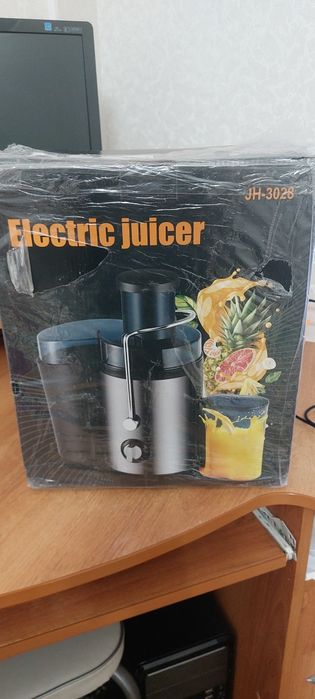 Электрическая соковыжималка