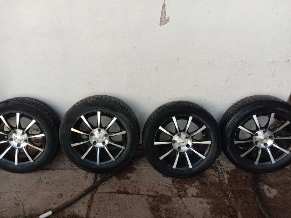Продам титановые диски р 15 с резиной