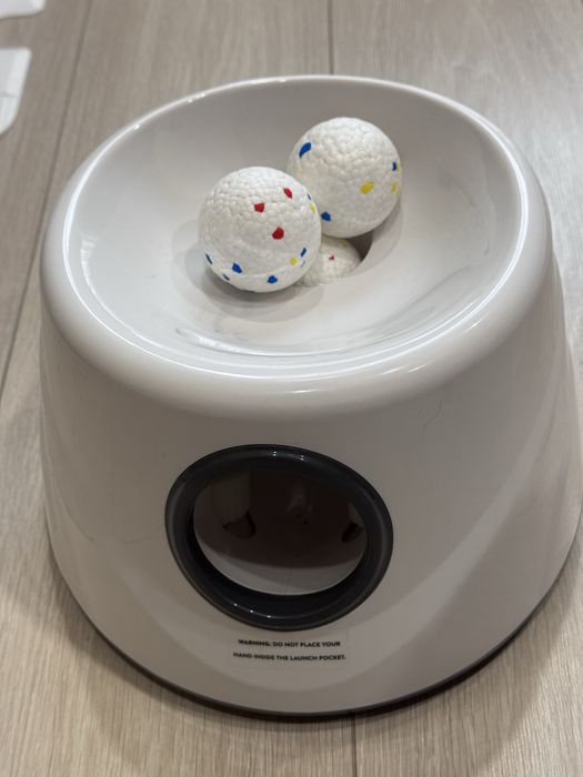 Автоматичен уред за хвърляне на топки за кучета