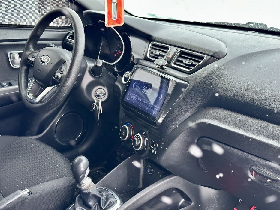 Kia Rio 1.4 MT 2014 год