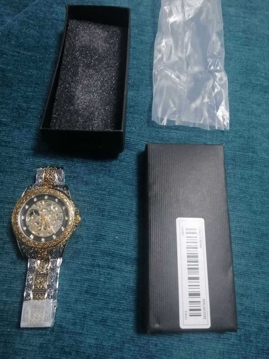 vand ceas  mecanice 2/3 din el este auto mecanic