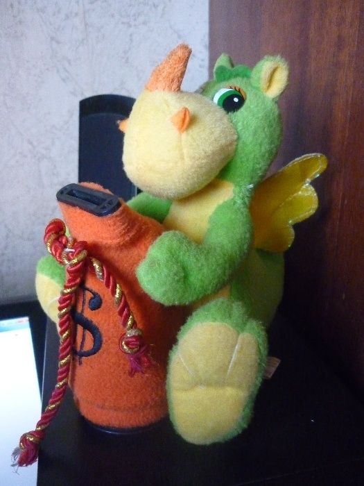 Музыкальная игрушка - копилка.