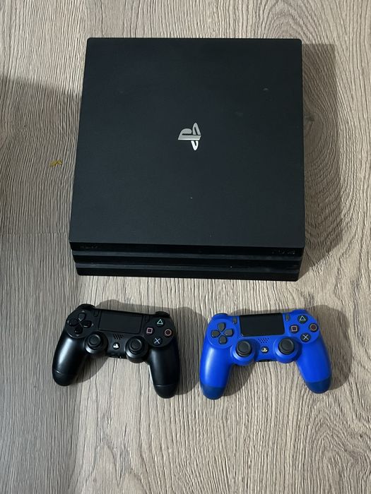 Playstation 4 Pro 1TB + 2 manete + cabluri + 200+ jocuri