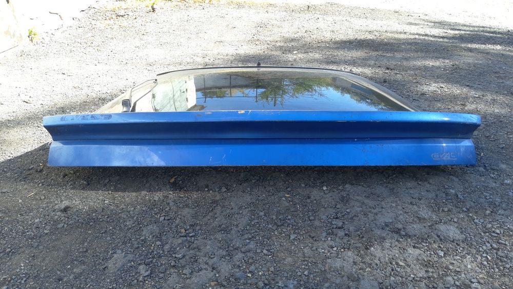 Крышка багажника Mazda 323F