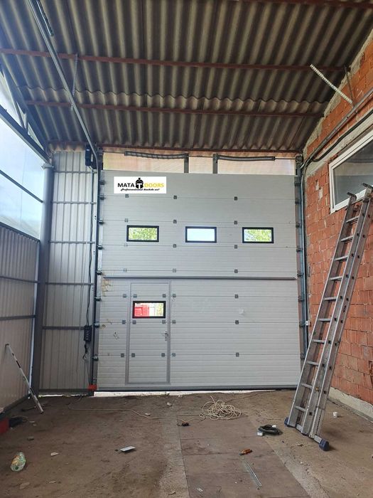 Distribuim la cel mai bun pret usi de garaj-TRANSPORT GRATUIT