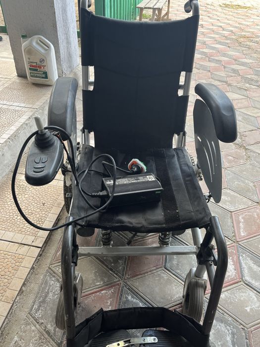 Электрическая инвалидная коляска