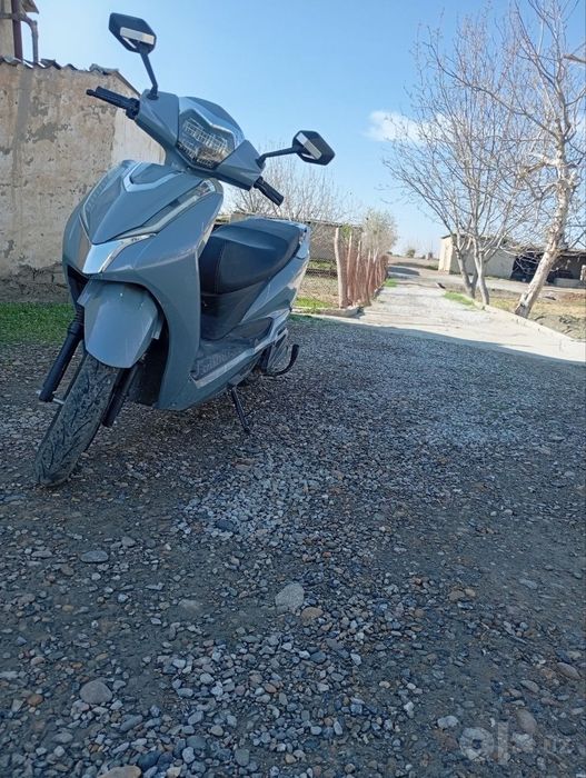 Skuter. Motosikl