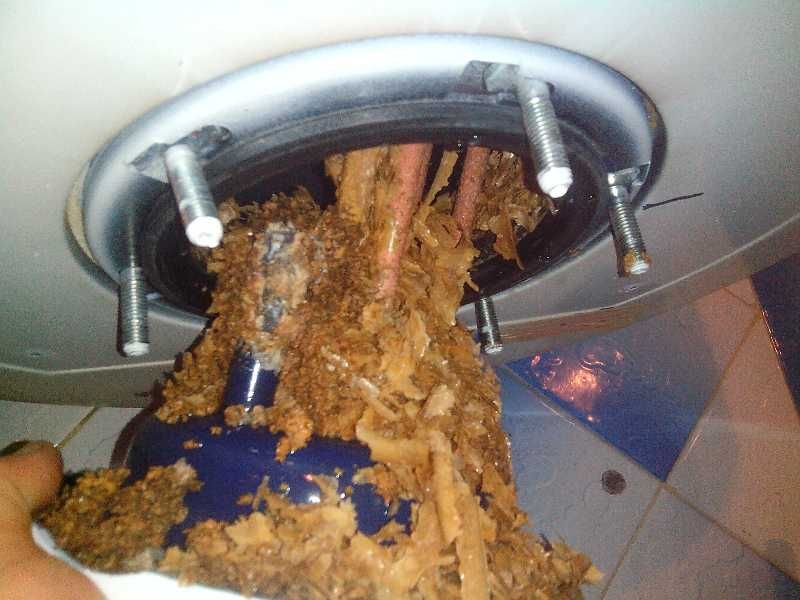 Aristonsuv isitgich tozalash va tamirlash .