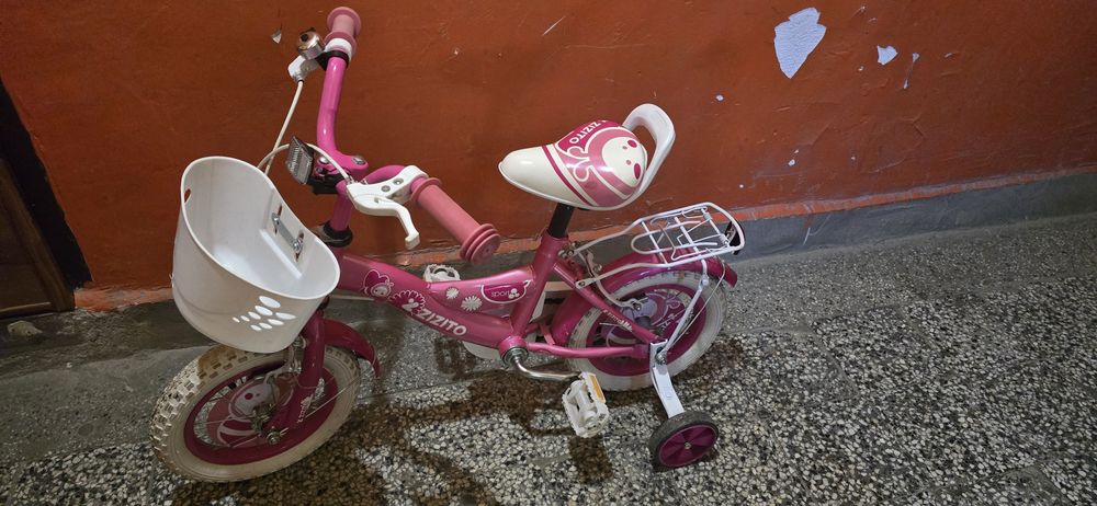 Детски велосипед с помощни колела