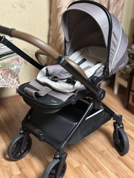 Продам прогулочную коляску Tomix Mirage