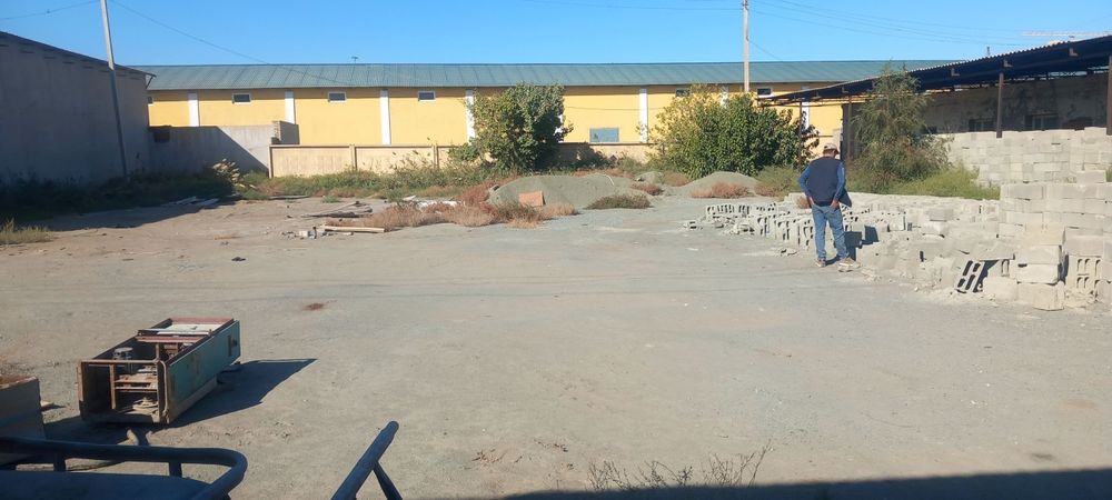 Урганч шахарда ишлаб чикаришга мулжалланган бино ва 20 сотик ер майдон