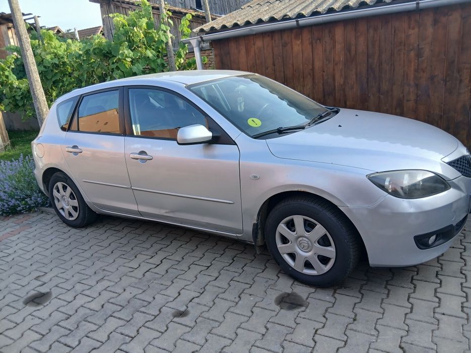 Vând  Mazda 3  anul 2008