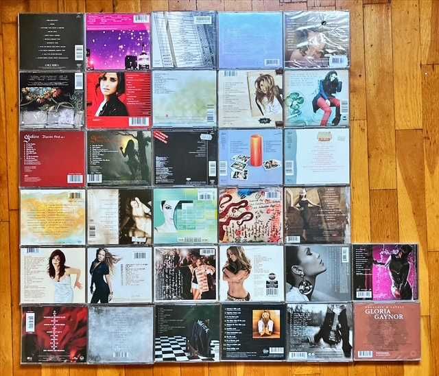 Lot CD orig: Thalia, ABBA, Melua, N. Jones, Madonna, Carey, Shakira, Estefan, Lopez..