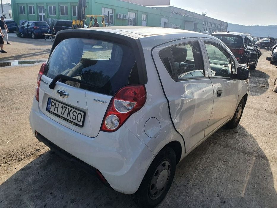 Dezmembrez Chevrolet Spark motor 1.0 benzina 68 cp, LMT kit pornire ambreiaj volanta plafon bara compresor ac dezmembrari