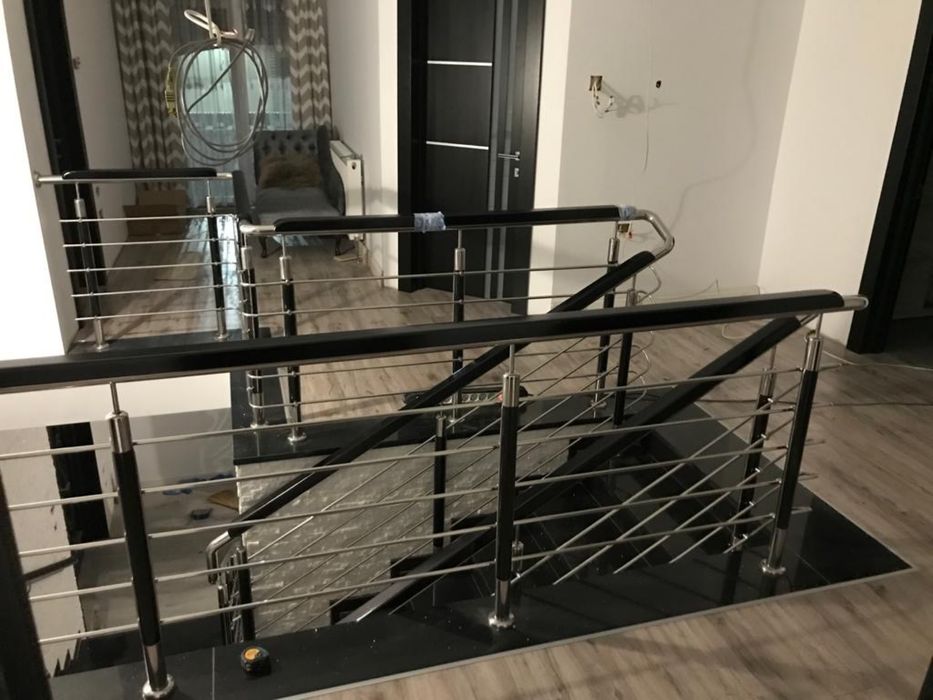 Balustrazi de inox,scara fier forjat si scari de lemn.