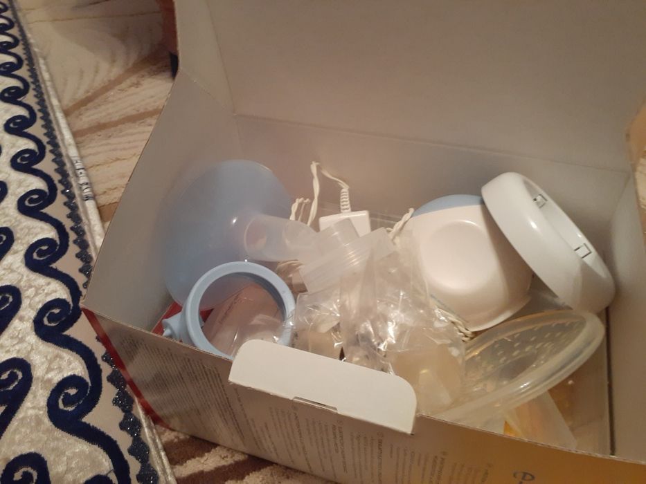 Продам молокоотсос е-    Motoon