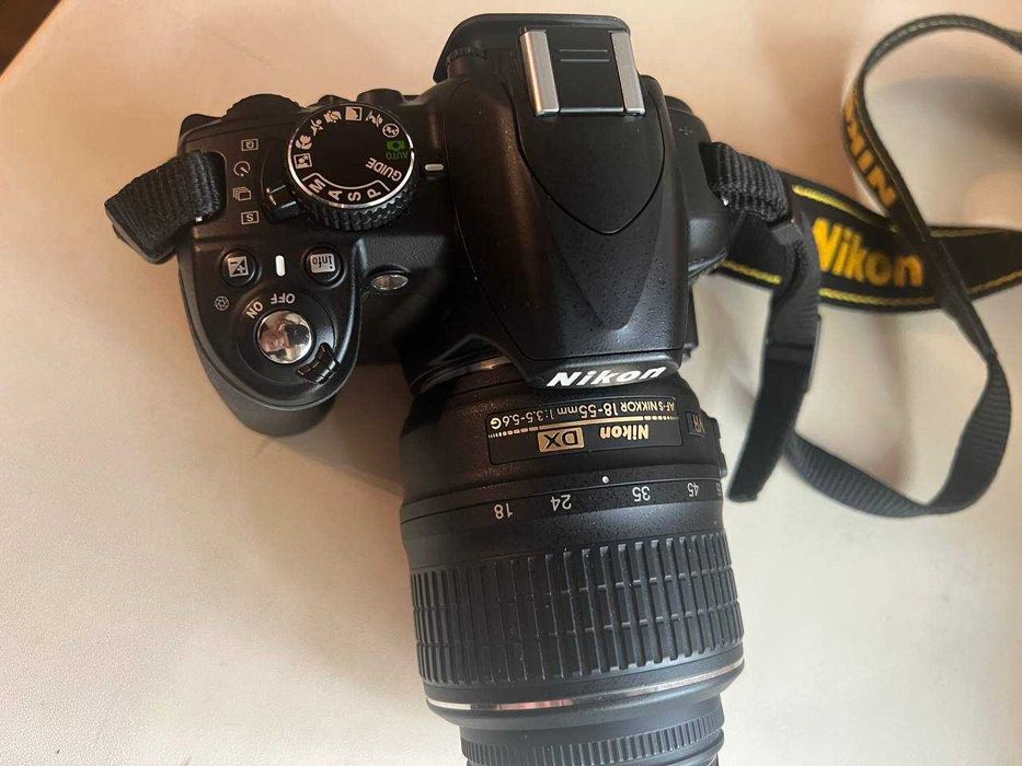 Nikon D3100 + 18-55mm