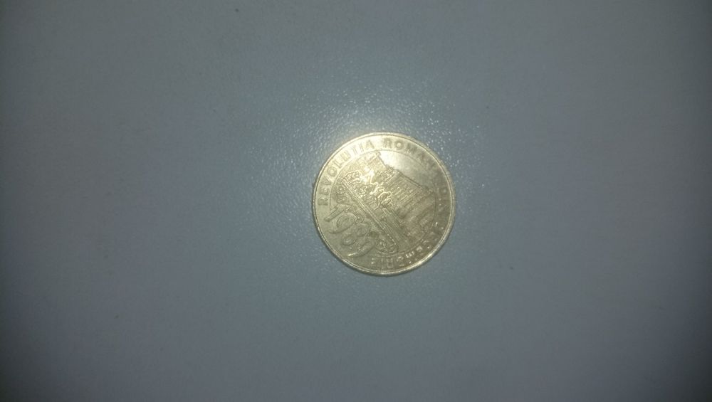 Vând monedă de 50 bani de la Revoluția României din Decembrie