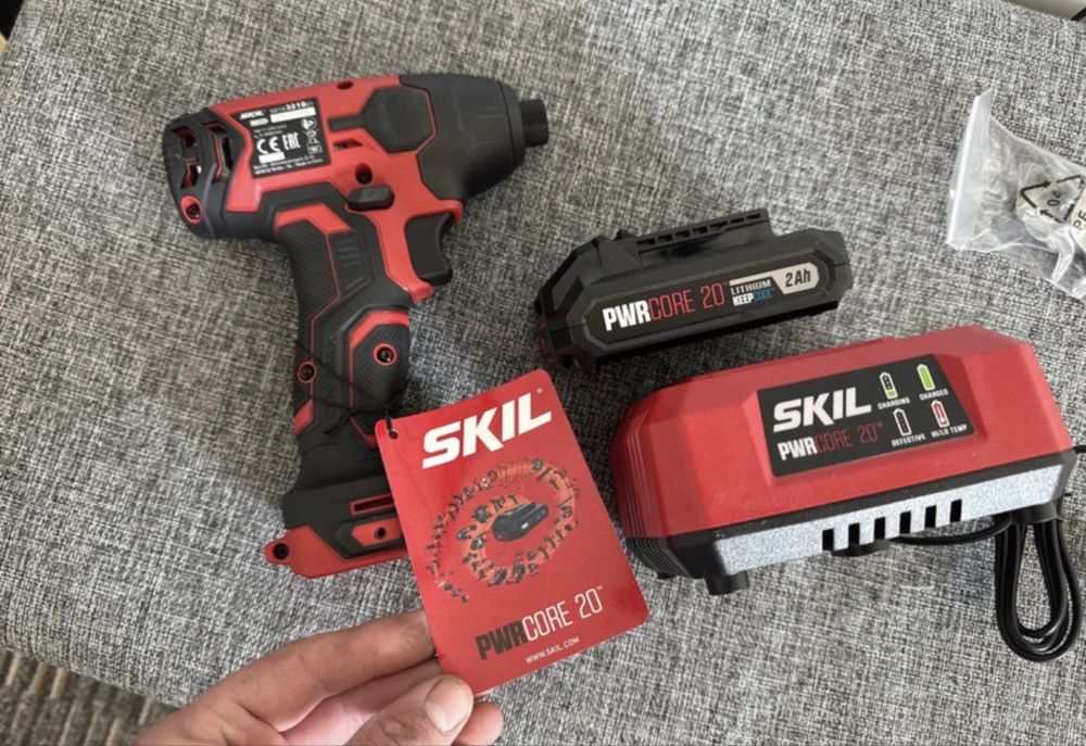 Masina de insurubat cu impact Skil cu acumulator&incarcator 20 V, 2 Ah