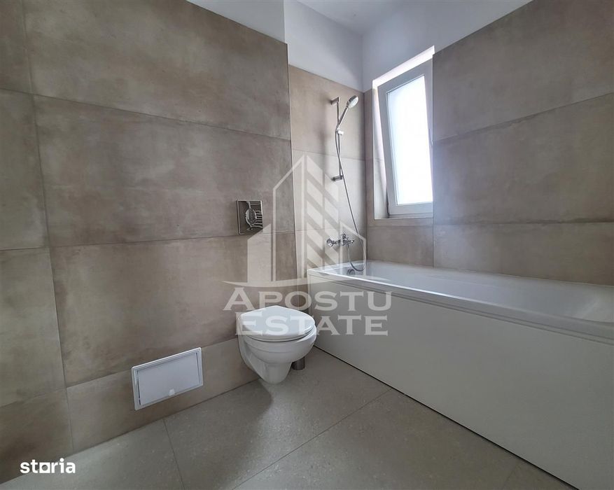 Apartament de inchiriat 3 camere, 2 bai si parcare, bloc nou,Aradului