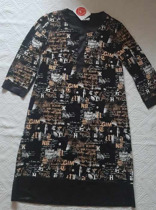 Rochie noua cu eticheta marimea 42
Dim.lg.103 cm,lat.bust 50 cm x 2,t