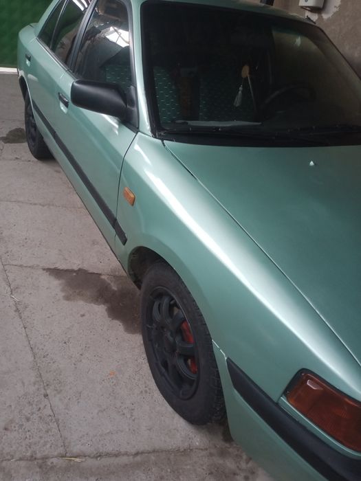 Мазда 323 сатылады журип тур