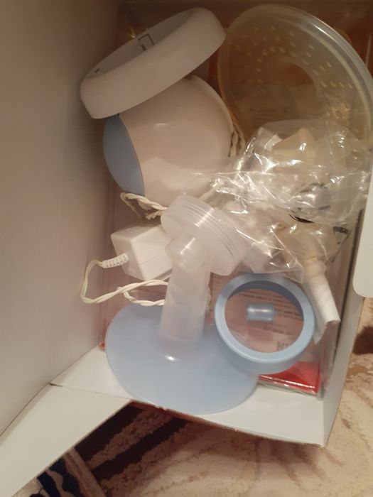 Продам молокоотсос е-    Motoon