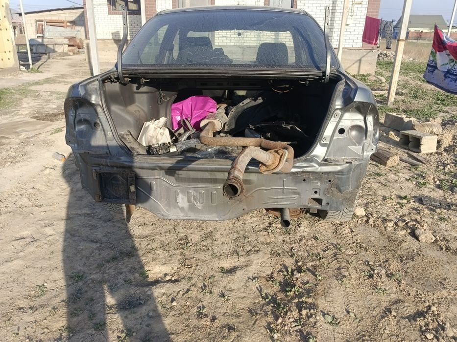 Мазда 323      200 000тг