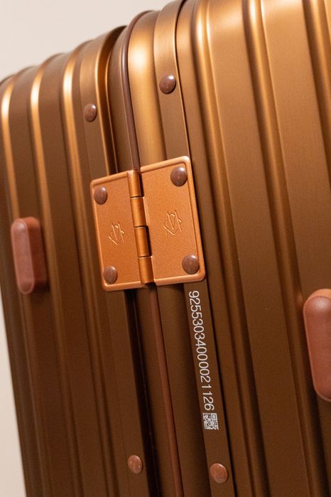 RIMOWA Bronze Collection — лимитированный чемодан (Check-In M)
