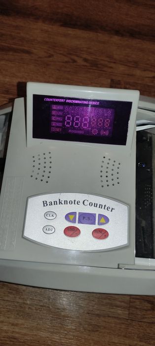 Машинка для счёта денег.