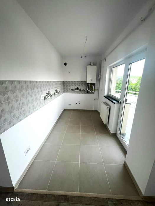 Apartament nou,INTABULAT, 95 000 euro cu loc de parcare inclus, Bucium