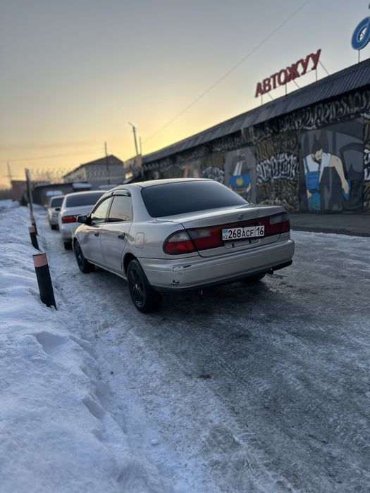 Продам машину mazda familia