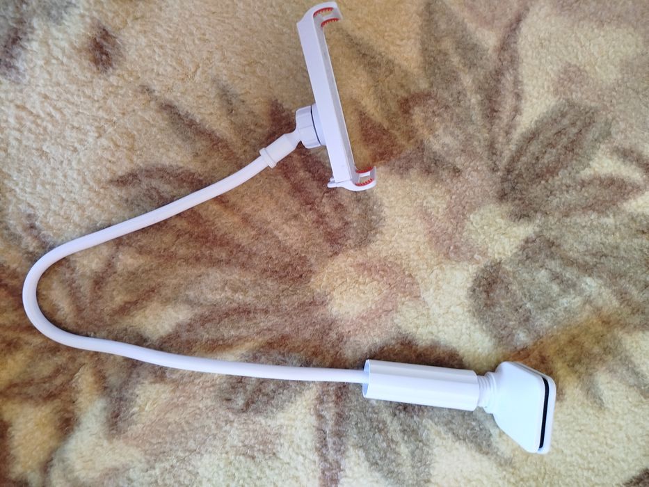 Гънеща се стойка за телефон