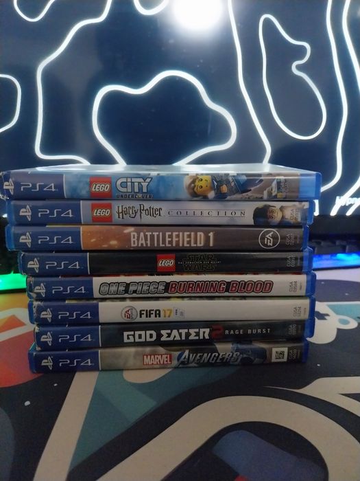PS4 pro 1TB + 8 jocuri + o maneta