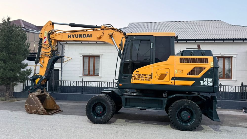 Услуги экскаватора колесный