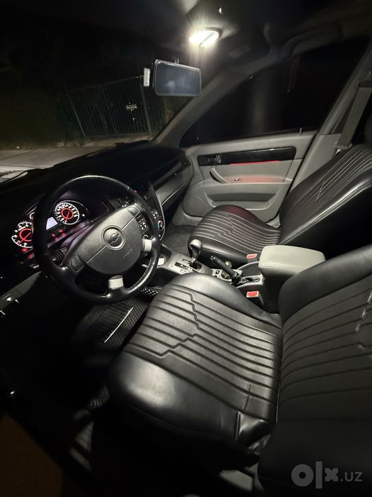 Chevrolet gentra qora rangli 2022-yil