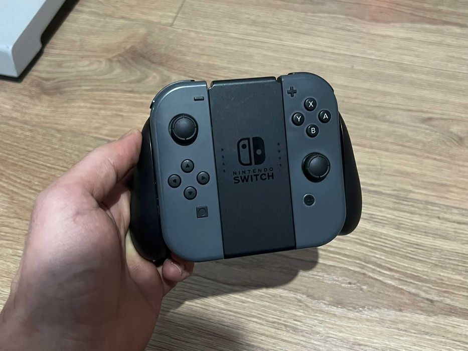 Joycon Nintendo switch+grip 100% original Nintendo,perfect functional
