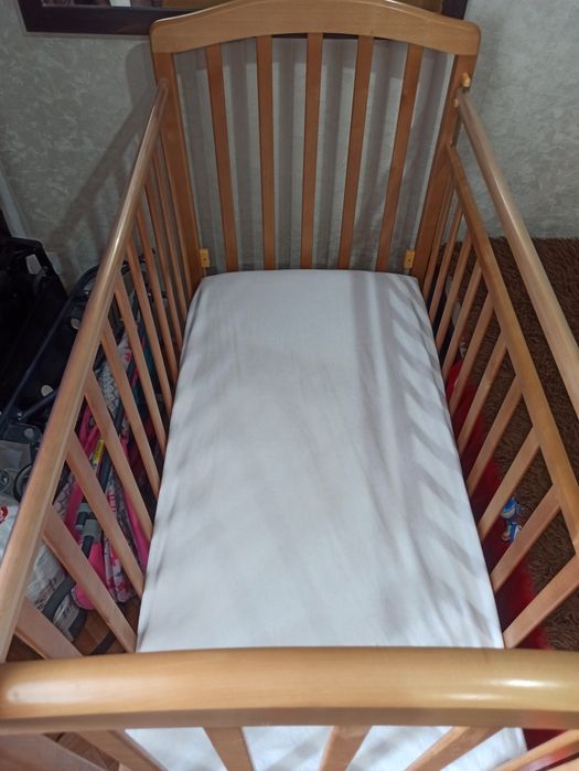 Кроватка с маятником