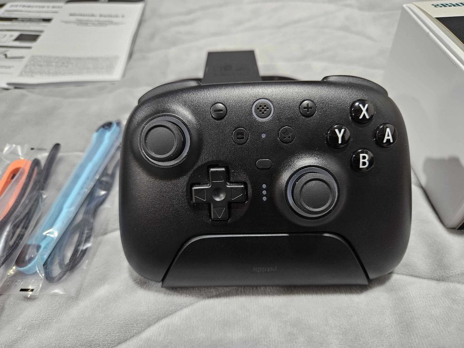 Nintendo Switch 2 комплект (4 игри, контролер, калъф Nacon, силиконов кейс)