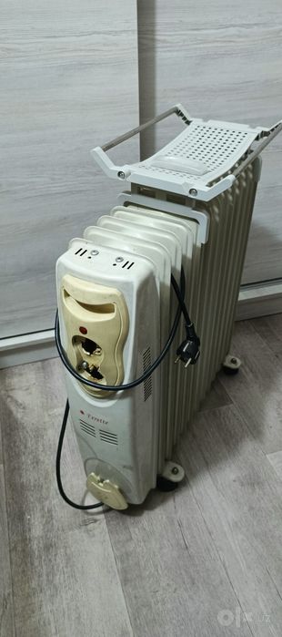 Масляный обогреватель