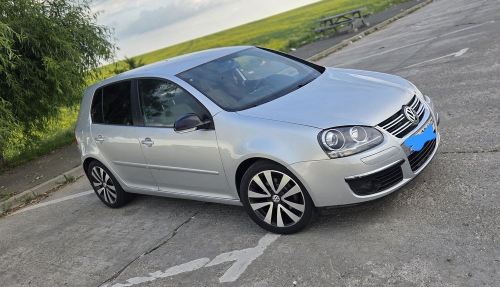 Golf 5 1.6 fsi 115 cp
