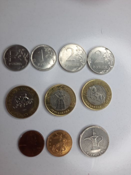 Продам монету 100тг