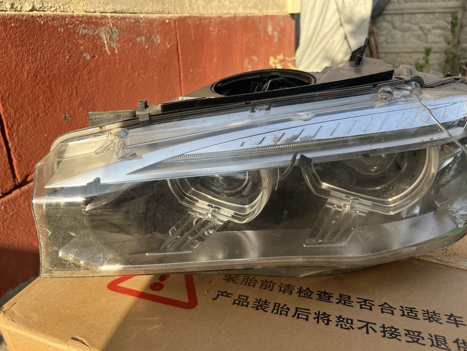 Передня левая фара на  BMW x 5